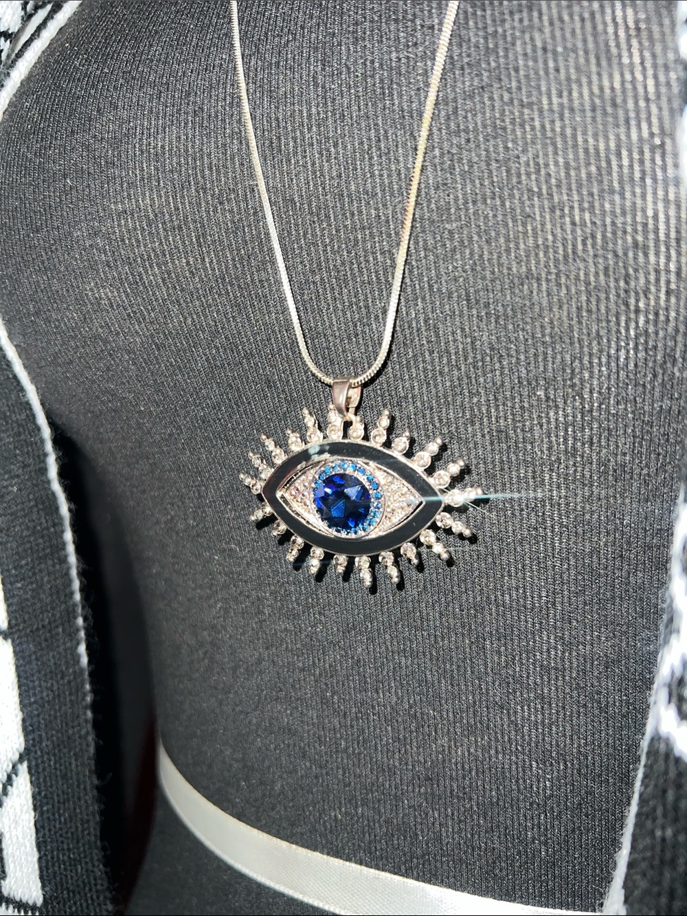 Silver Evil Eye Pendant Necklace with Blue Crystal